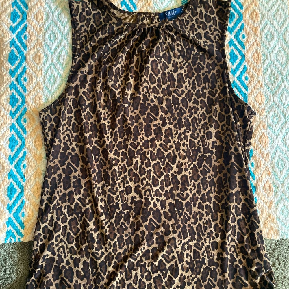 this is an open cut cheetah print blouse 👚